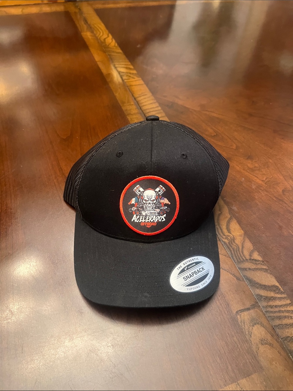 Kids Black Snapback Hat with Red-Trim Skull Patch
